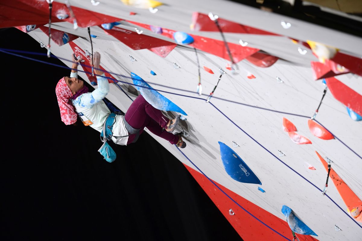 Iran's Elnaz Rakabi climbs during a competition.