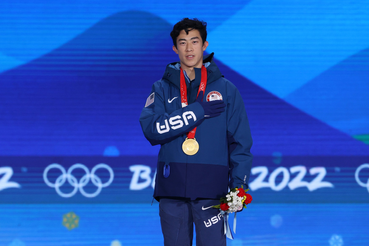 BEIJING, CHINA - FEBRUARY 10: Gold medallist Nathan Chen of Team United States celebrates during the Figure Skating Men Single Skating medal ceremony on Day 6 of the Beijing 2022 Winter Olympic Games at Beijing Medal Plaza on February 10, 2022 in Beijing, China. (Photo by Jean Catuffe/Getty Images)
