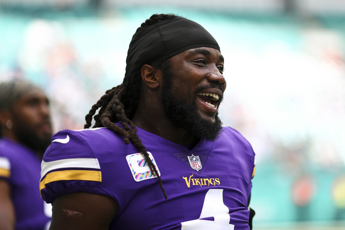 MIAMI GARDENS, FL - OCTOBER 16: Dalvin Cook #4 of the Minnesota Vikings smiles prior to an NFL football game against the Miami Dolphins at Hard Rock Stadium on October 16, 2022 in Miami Gardens, Florida. (Photo by Kevin Sabitus/Getty Images)