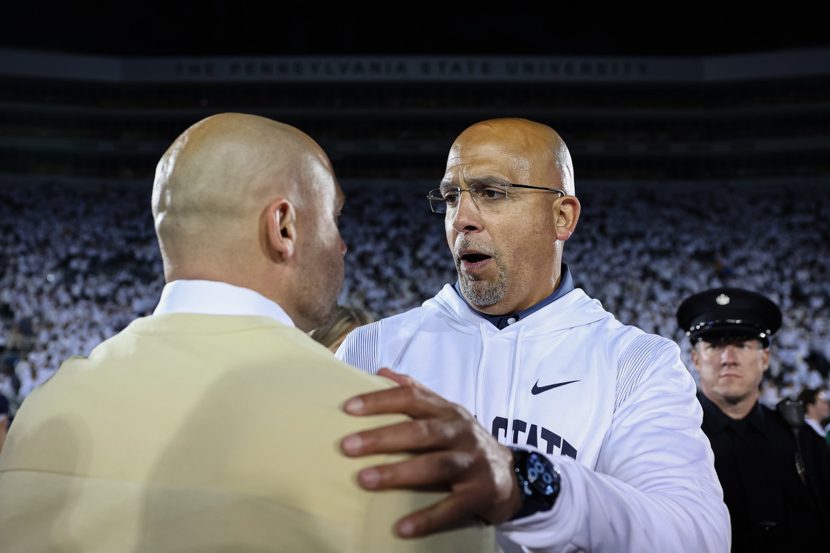 James Franklin shakes hands with P.J. Fleck after a game.