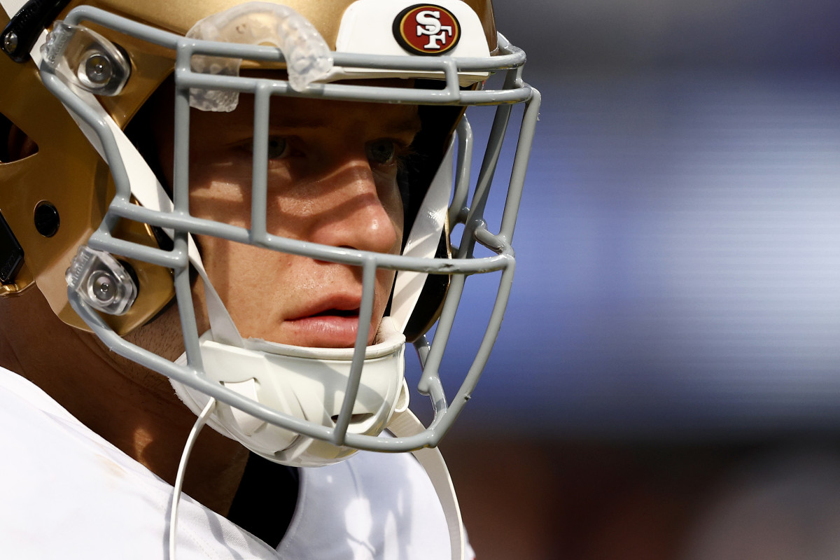 Christian McCaffrey of the San Francisco 49ers reacts after a run