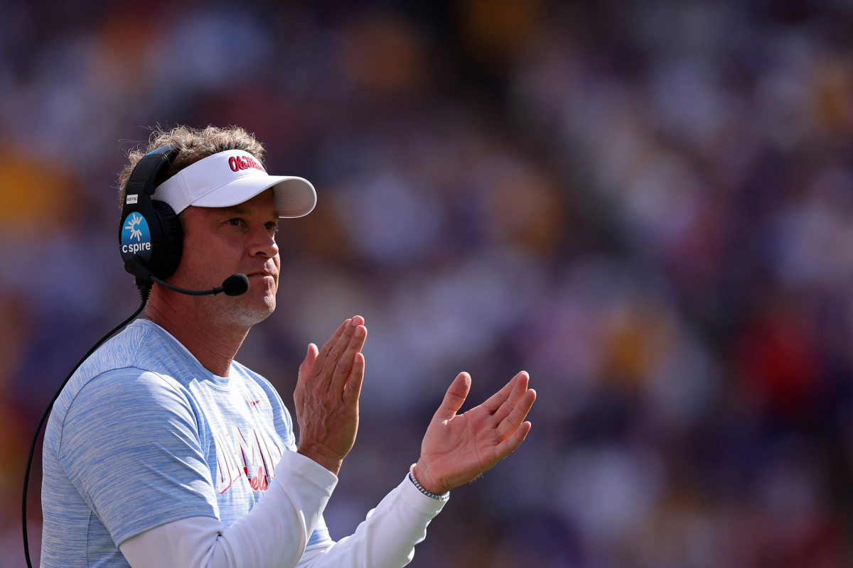 Ole Miss head coach Lane Kiffin claps during a game against the LSU Tigers.