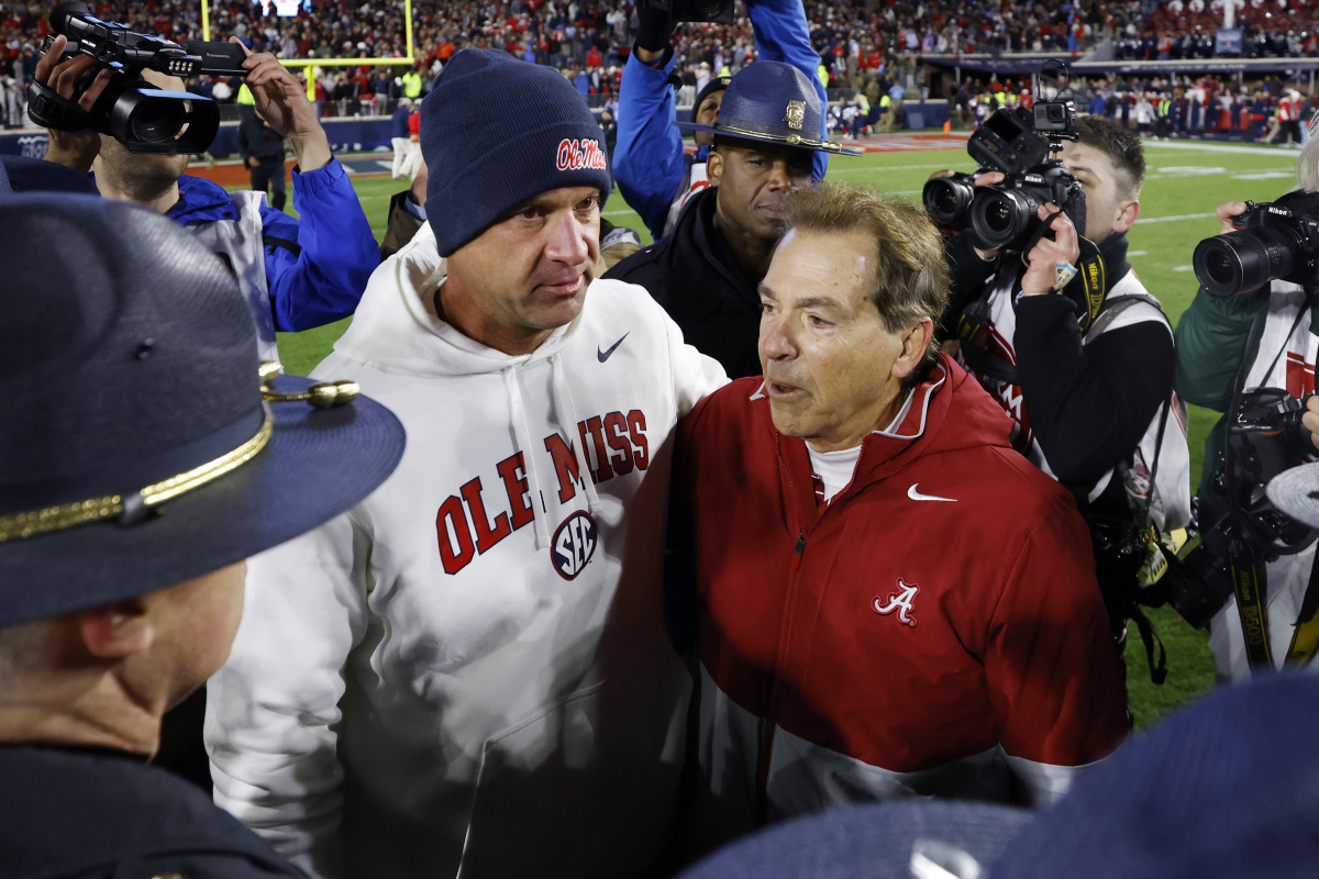 OXFORD, MS - NOVEMBER 12: Alabama Crimson Tide head coach Nick Saban meets with Mississippi Rebels head coach Lane Kiffin following a college football game on November 12, 2022 at Vaught-Hemingway Stadium in Oxford, Mississippi. (Photo by Joe Robbins/Icon Sportswire via Getty Images)
