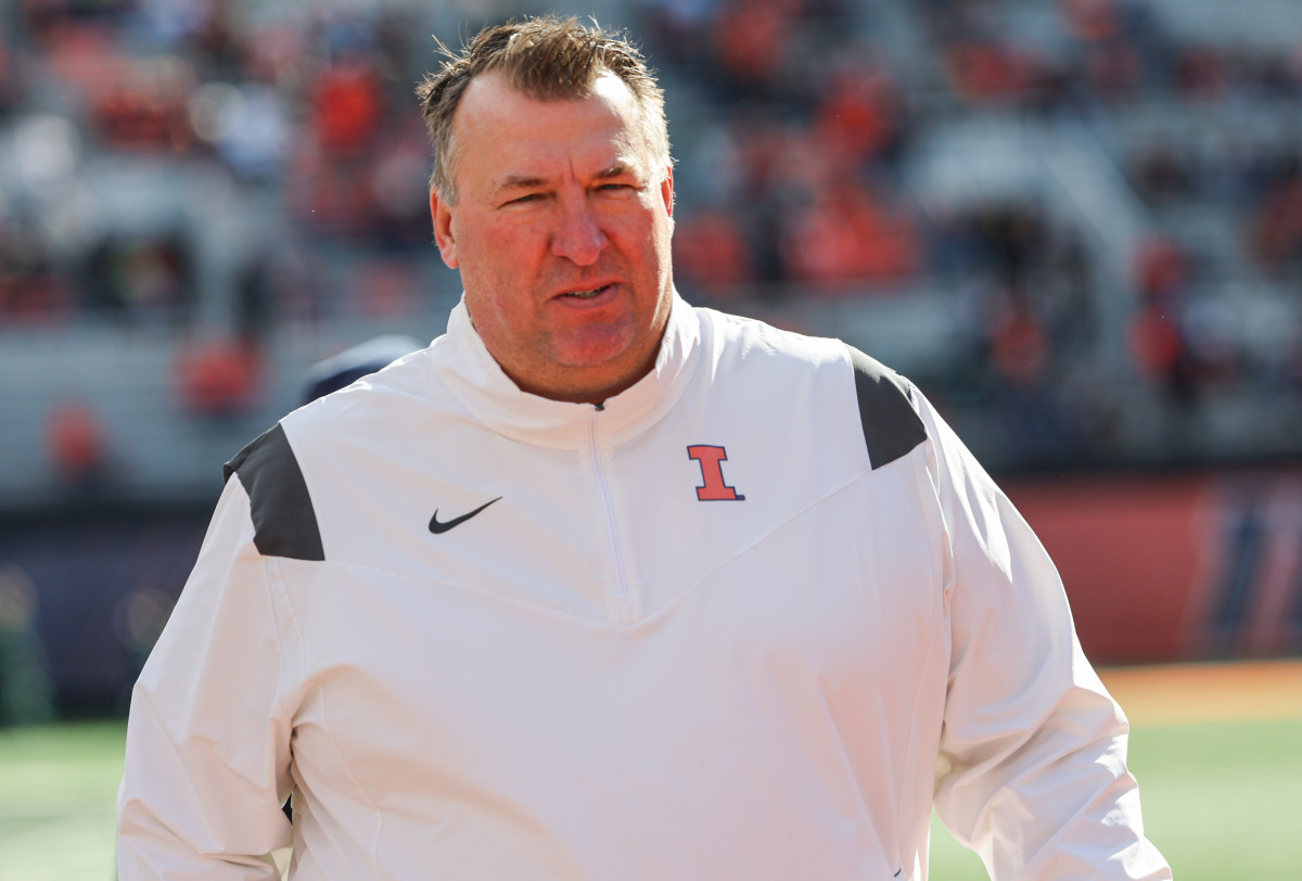 Bret Bielema walking on the field for Illinois.