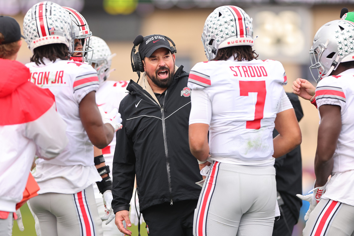 EVANSTON, ILLINOIS - NOVEMBER 05: Head coach Ryan Day of the Ohio State Buckeyes talks with C.J. Stroud #7 against the Northwestern Wildcats during the second half at Ryan Field on November 05, 2022 in Evanston, Illinois. (Photo by Michael Reaves/Getty Images)