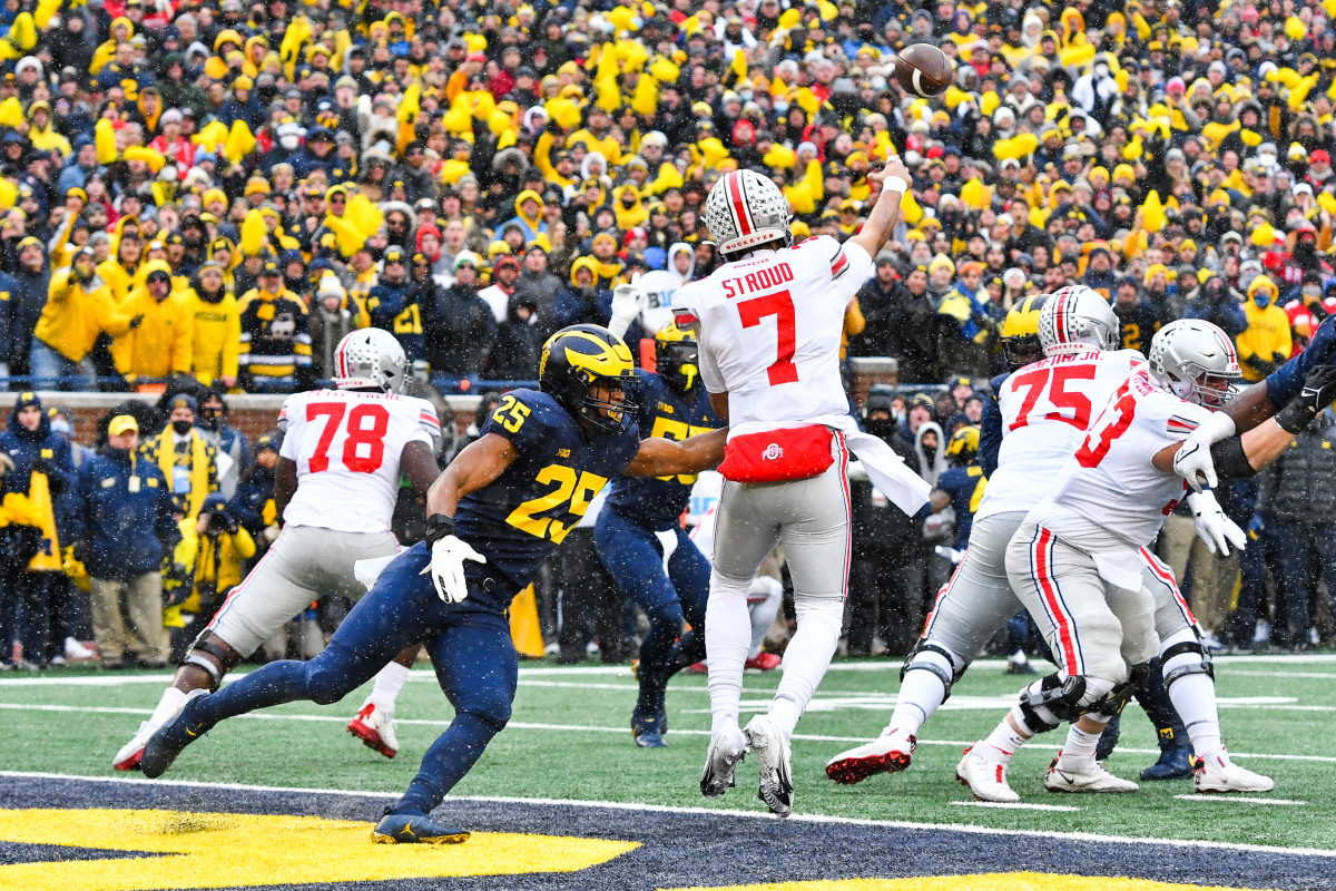 CJ Stroud attempts a pass against Michigan.