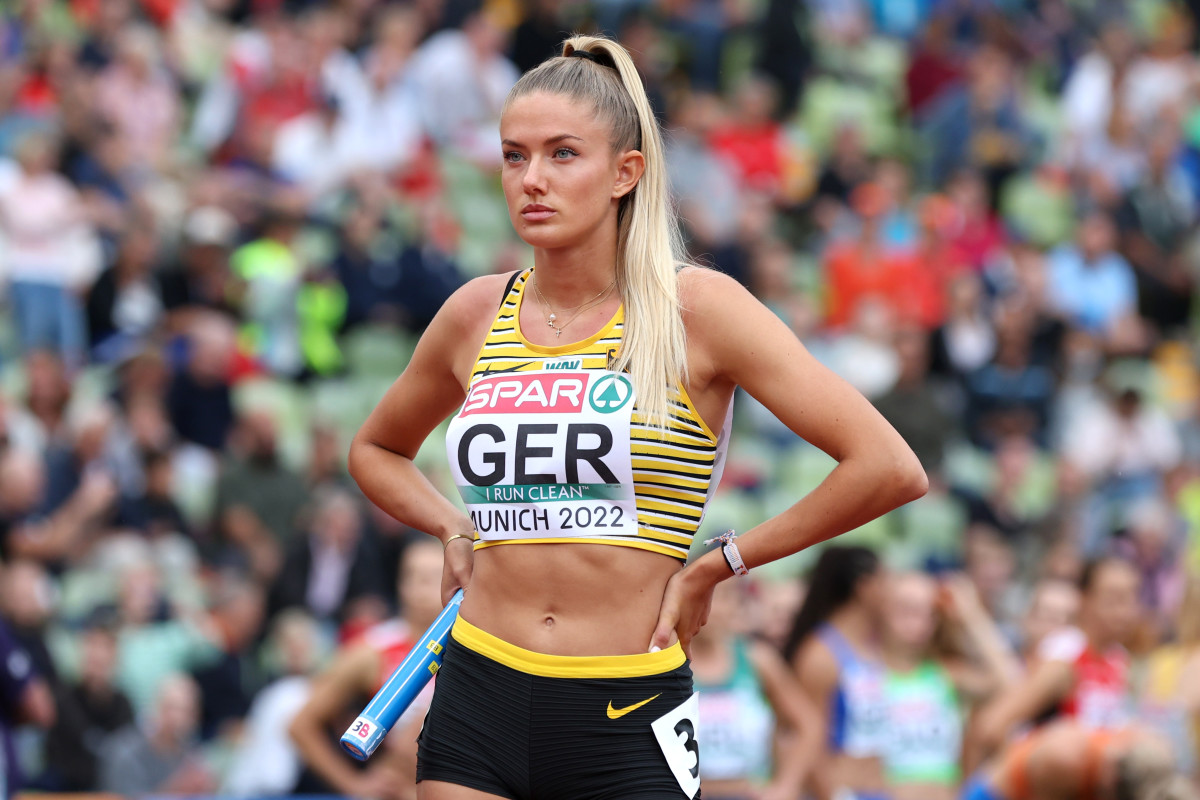 MUNICH, GERMANY - AUGUST 19: Alica Schmidt of Germany prepares to compete in the Women's 4 x 400m Relay Round 1 - Heat 2 during the Athletics competition on day 9 of the European Championships Munich 2022 at Olympiapark on August 19, 2022 in Munich, Germany. (Photo by Alexander Hassenstein/Getty Images)