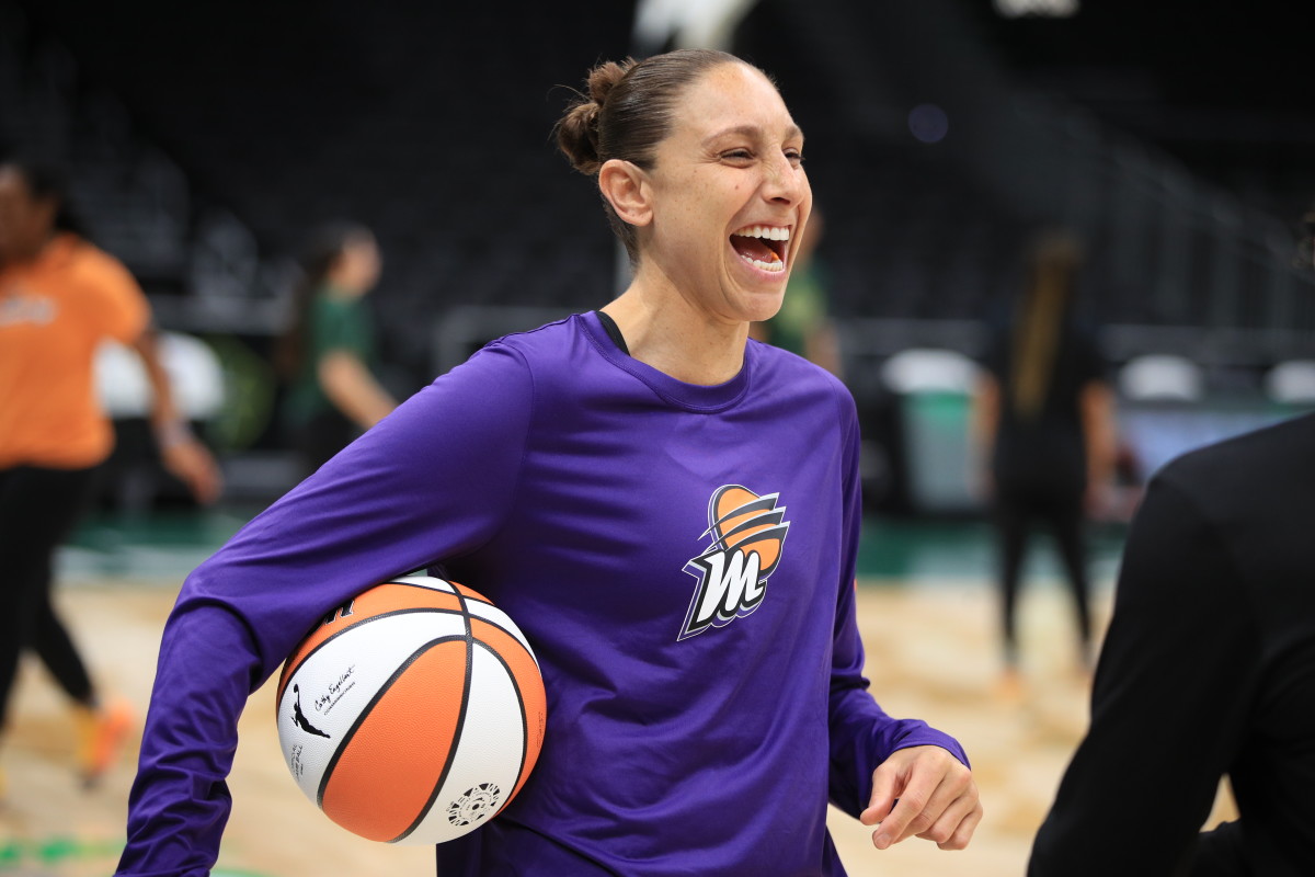 Phoenix Mercury guard Diana Taurasi laughs ahead of a WNBA preseason game.