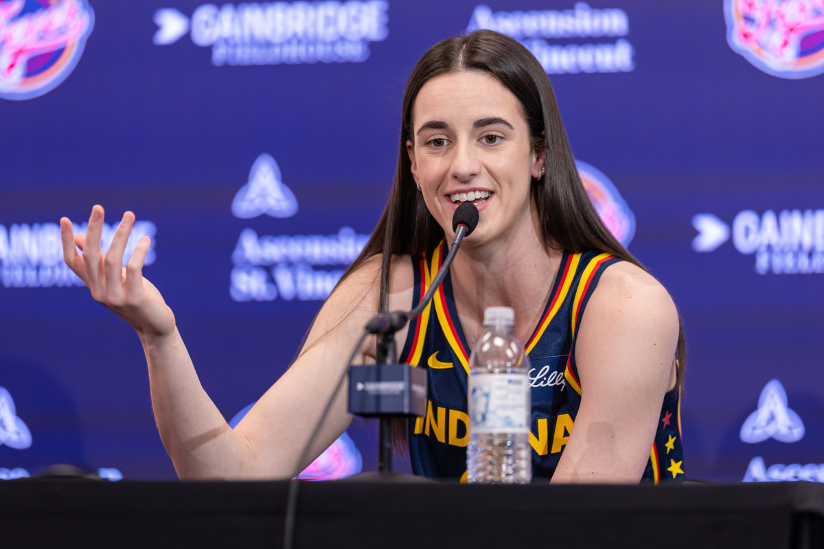 INDIANAPOLIS, INDIANA - MAY 1: Caitlin Clark #22 of the Indiana Fever talks to reporters during media day activities at Gainbridge Fieldhouse on May 1, 2024 in Indianapolis, Indiana. NOTE TO USER: User expressly acknowledges and agrees that, by downloading and or using this photograph, User is consenting to the terms and conditions of the Getty Images License Agreement. (Photo by Michael Hickey/Getty Images)