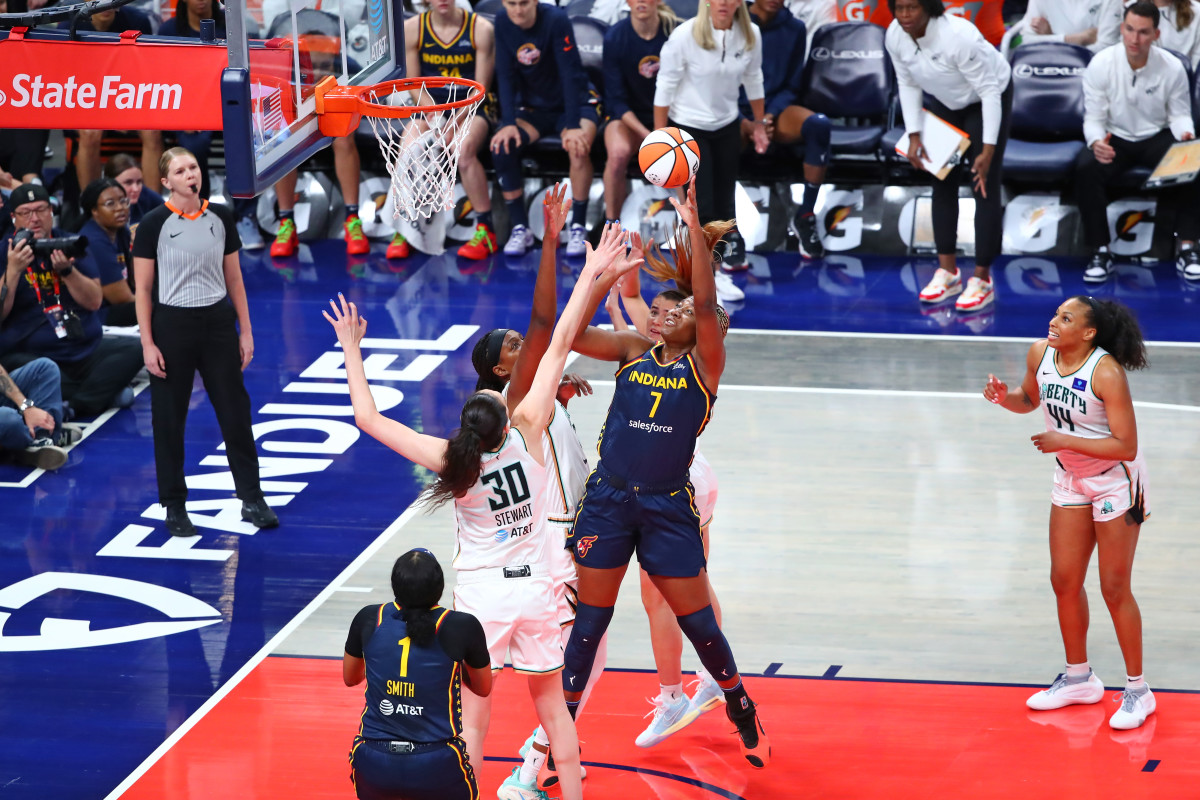 INDIANAPOLIS, IN - MAY 16: Aliyah Boston #7 of the Indiana Fever drives to the basket during the game against the New York Liberty on May 16, 2024 at Gainbridge Fieldhouse in Indianapolis, Indiana. NOTE TO USER: User expressly acknowledges and agrees that, by downloading and or using this Photograph, user is consenting to the terms and conditions of the Getty Images License Agreement. Mandatory Copyright Notice: Copyright 2024 NBAE (Photo by David L. Nemec/NBAE via Getty Images)