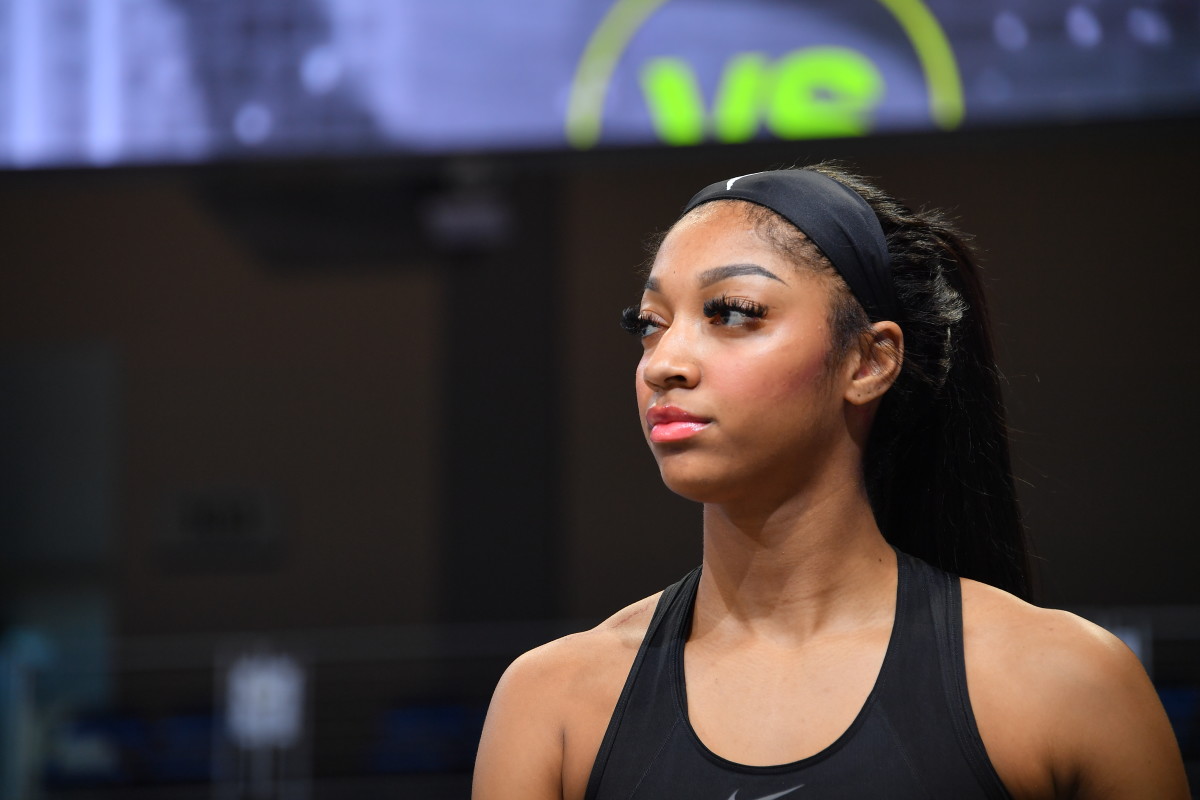 ARLINGTON, TX -  MAY 15: Angel Reese #5 of the Chicago Sky looks on before the game against the Dallas Wings on May 15, 2024 at the College Park Center in Arlington, TX. NOTE TO USER: User expressly acknowledges and agrees that, by downloading and or using this photograph, User is consenting to the terms and conditions of the Getty Images License Agreement. Mandatory Copyright Notice: Copyright 2024 NBAE (Photo by Michael Gonzales/NBAE via Getty Images)