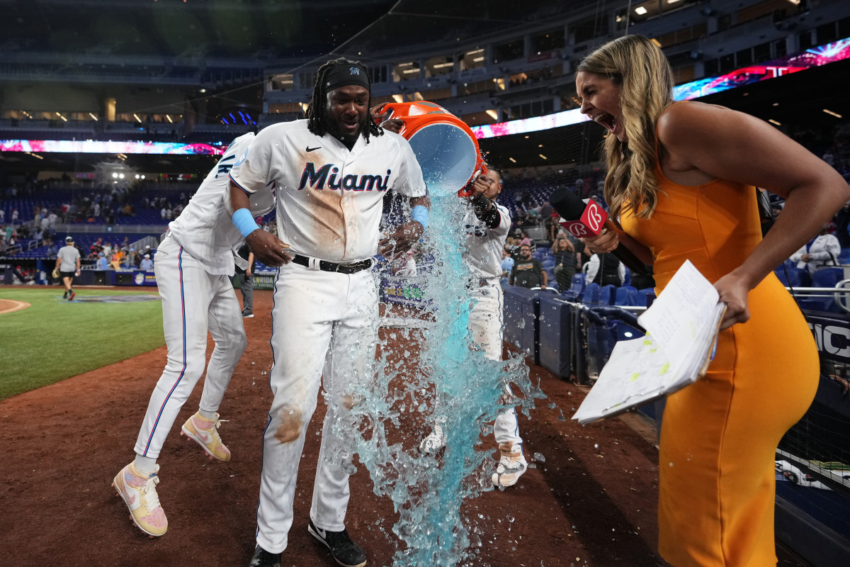 Meet The Sideline Reporter Who Got Soaked Last Night - The Spun