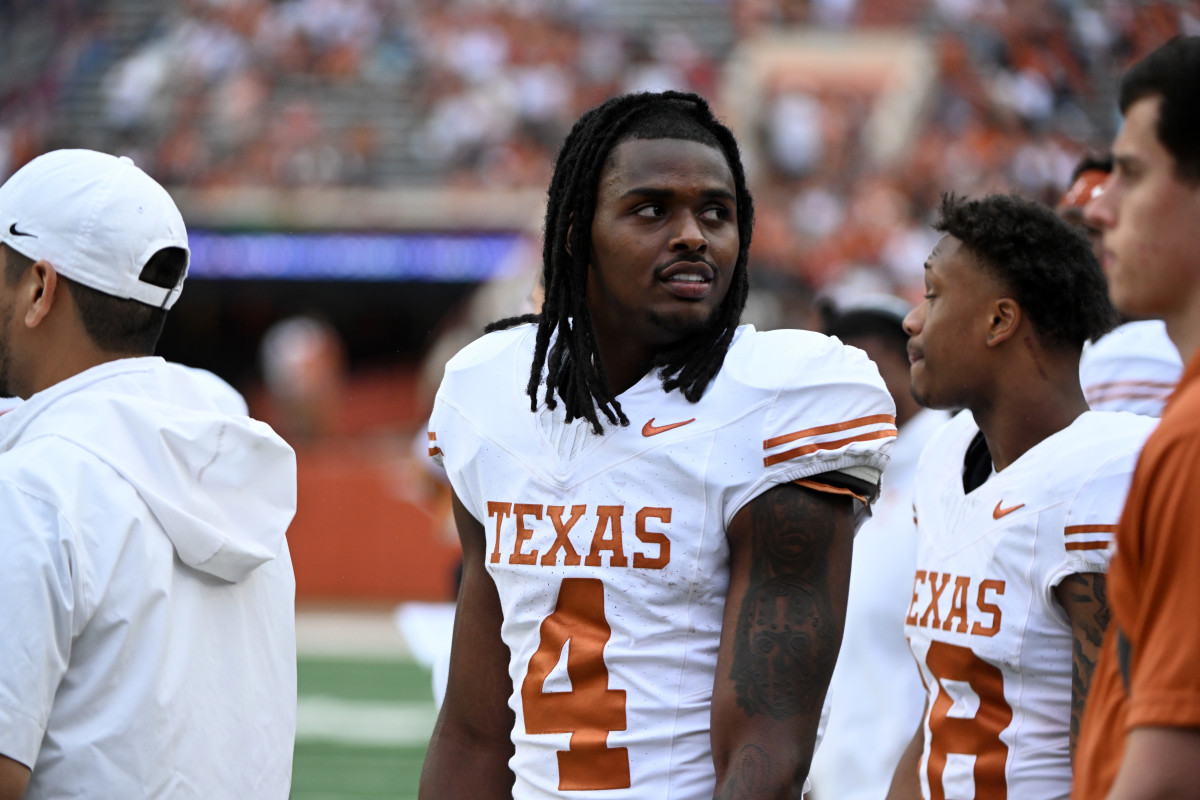 AUSTIN, TX - APRIL 20: Texas Longhorns RB C. J. Baxter (4) watches action from the sidelines during the Orange-White spring football game on April 20, 2024, at Darrell K Royal-Texas Memorial Stadium in Austin, TX. (Photo by John Rivera/Icon Sportswire via Getty Images)