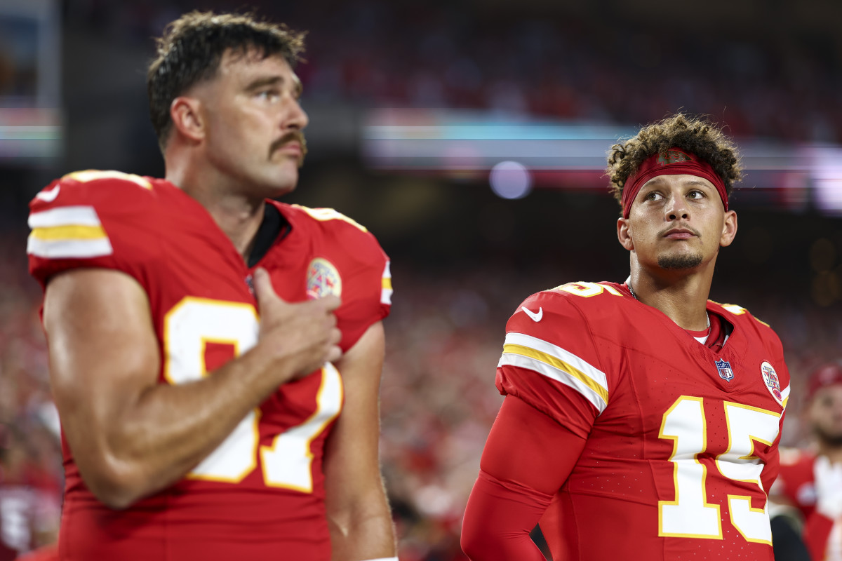 Chiefs on sideline for national anthem.