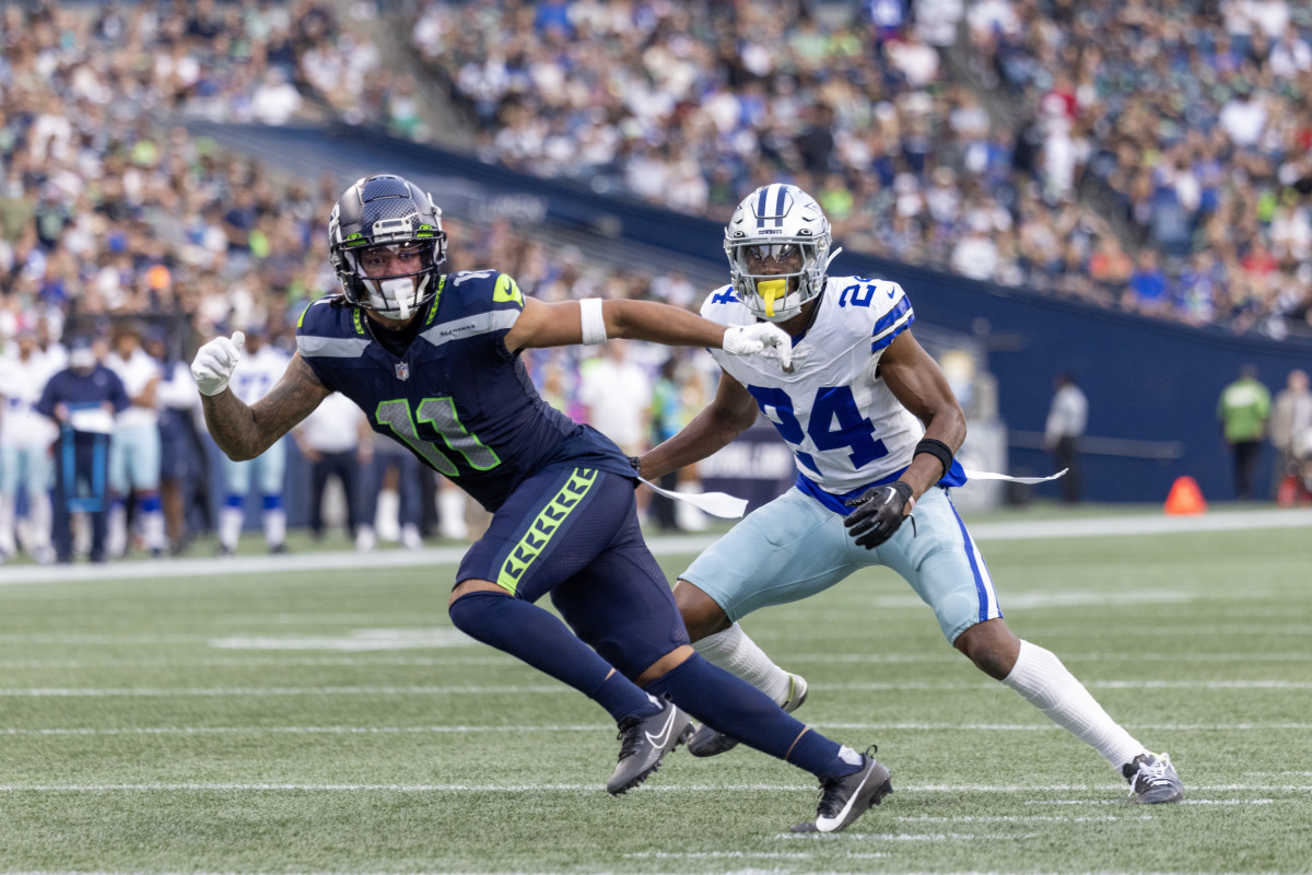 Tyler Lockett of the Seattle Seahawks waits for a timeout during a News  Photo - Getty Images