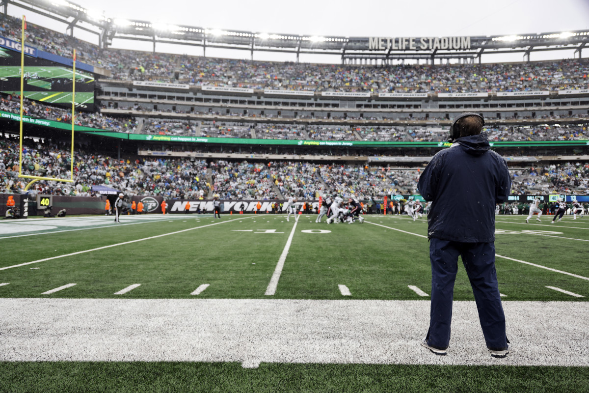 New England Patriots head coach Bill Belichick walks the sideline