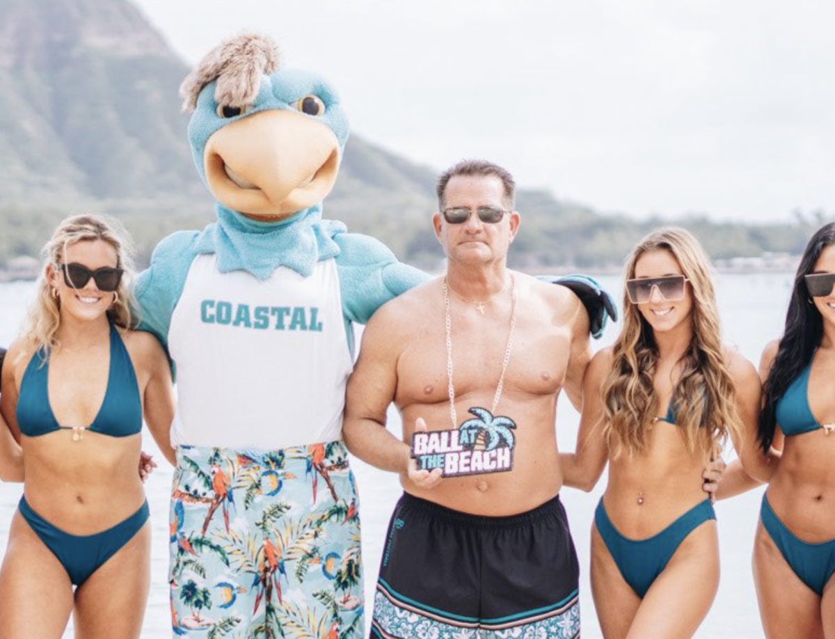 College Football Coach Posed For Swimsuit Photo With Team s