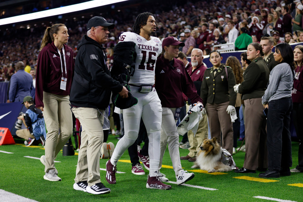 Video: Quarterback Injured On First Play Of The Texas Bowl - The Spun:  What's Trending In The Sports World Today