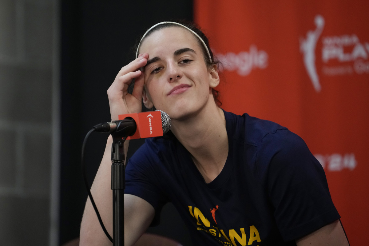 UNCASVILLE, CONNECTICUT - SEPTEMBER 25: Caitlin Clark #22 of the Indiana Fever looks on during a press conference after losing 81-87 to the Connecticut Sun in Game Two of the 2024 WNBA Playoffs first round at Mohegan Sun Arena on September 25, 2024 in Uncasville, Connecticut. (Photo by Joe Buglewicz/Getty Images)