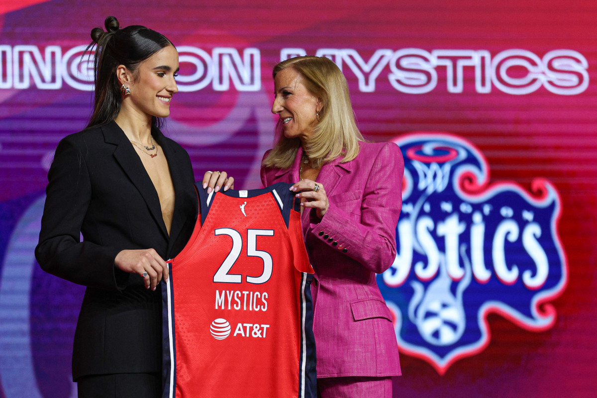 Apr 14, 2025; New York, New York, USA; Sonia Citron poses with WNBA commissioner Cathy Engelbert after being selected with the number three overall pick to the Washington Mystics in the 2025 WNBA Draft at The Shed at Hudson Yards. Vincent Carchietta-Imagn Images