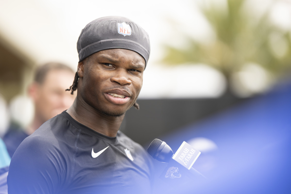 Travis Hunter's Final Prenup Decision Has Fans Going Crazy (Report) 2 JACKSONVILLE, FLORIDA - MAY 10: Travis Hunter #12 of the Jacksonville Jaguars speaks to the Media during Jacksonville Jaguars Rookie Minicamp at Miller Electric Center on May 10, 2025 in Jacksonville, Florida. (Photo by James Gilbert/Getty Images)