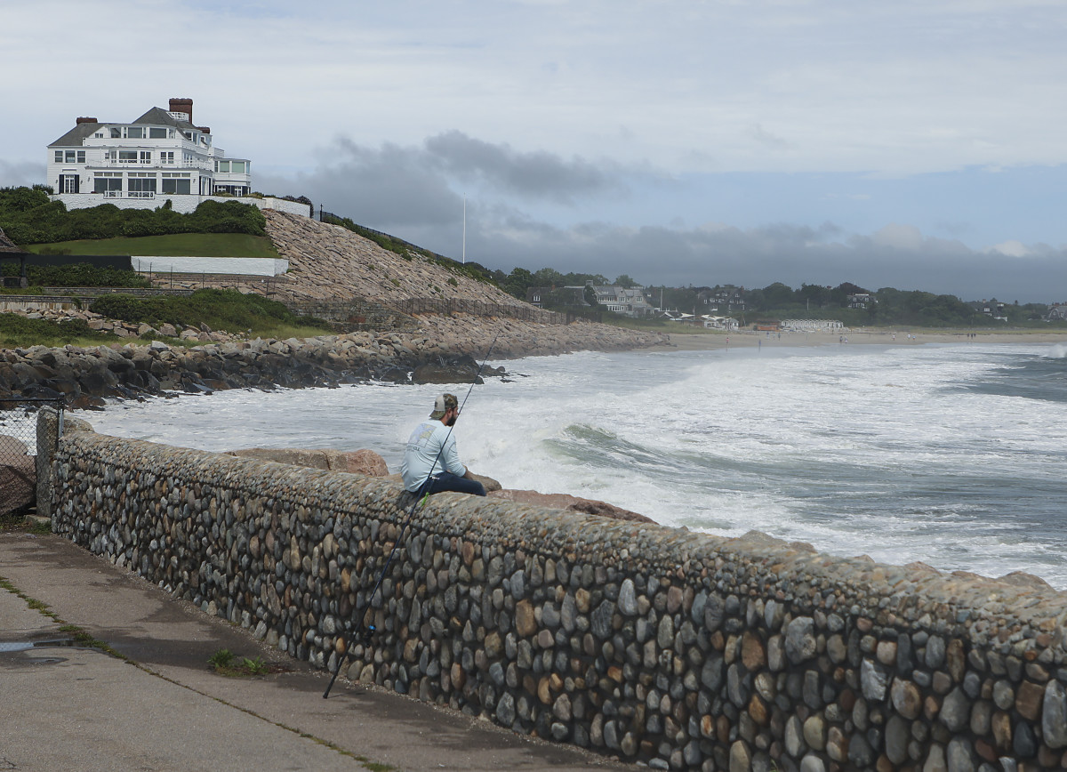 Breaking: Human Remains Found Near Taylor Swift's Property, Investigation Reveals A Shocking Truth 2 Westerly, RI - August 22: A man fishes at the Watch Hill Lighthouse for stripped bass with home of Taylor Swift in the background during the eye of the Tropical Storm Henri in Westerly, RI on Aug. 22, 2021. (Photo by Matthew J. Lee/The Boston Globe via Getty Images)
