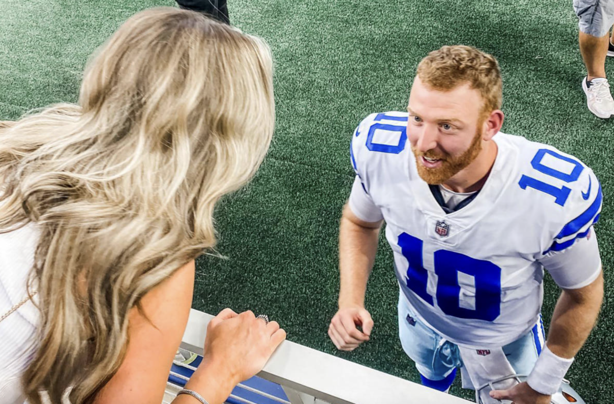 Cooper Rush's wife on the field.