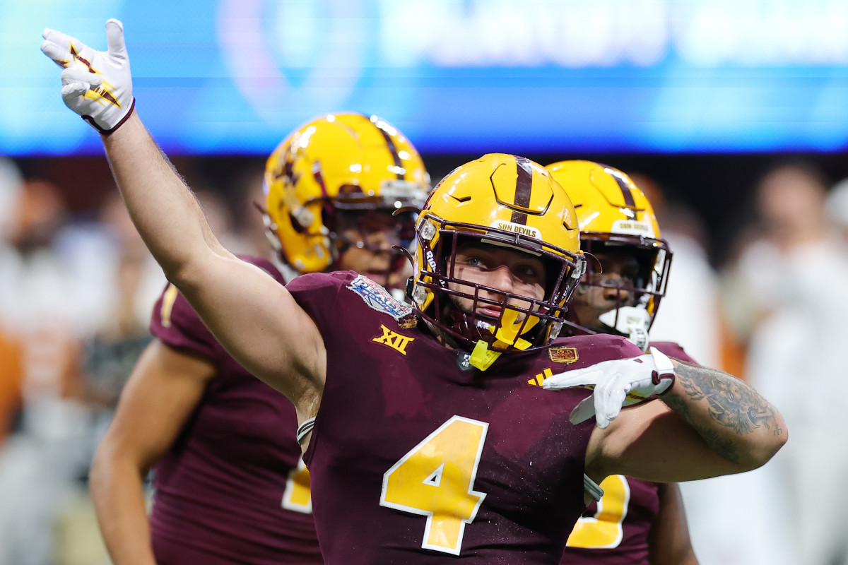 Cam Skattebo celebrates in the Peach Bowl.