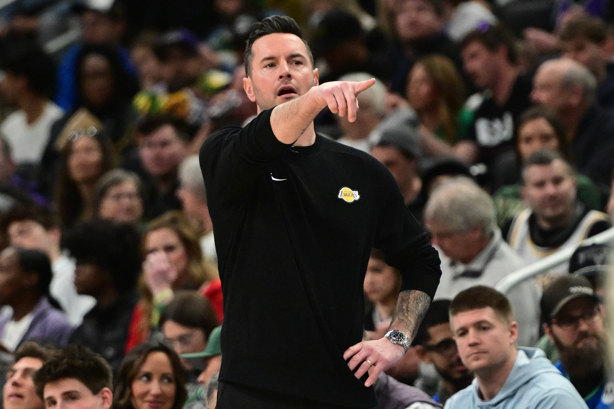 Los Angeles Lakers head coach JJ Redick calls a play in the third quarter against the Milwaukee Bucks at Fiserv Forum.