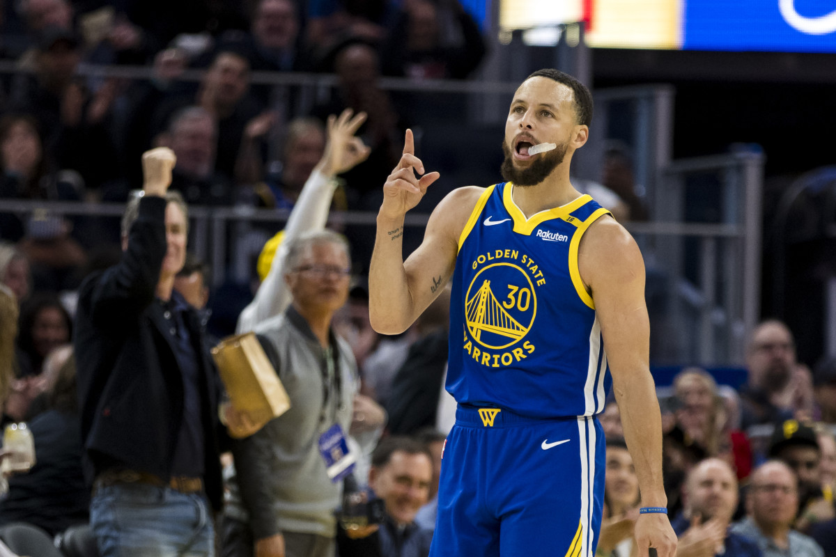 Golden State Warriors guard Stephen Curry (30) reacts after hitting a three-point shot against the Portland Trail Blazers.