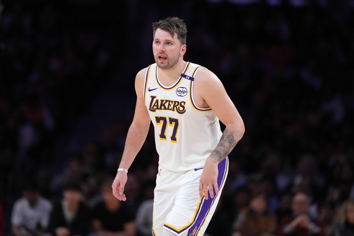 Los Angeles Lakers guard Luka Doncic (77) reacts against the Phoenix Suns.