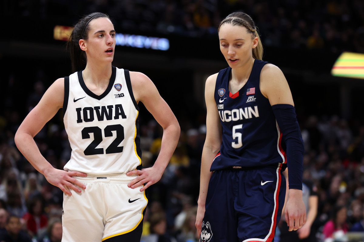 Paige Bueckers and Caitlin Clark compete in the Final Four.
