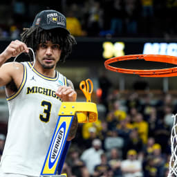 Michigan Star Elliot Cadeau Receiving Medical Attention Before Final Four