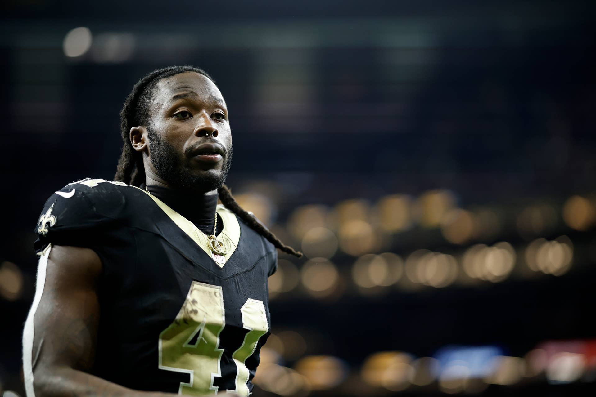 Alvin Kamara walking off the field.