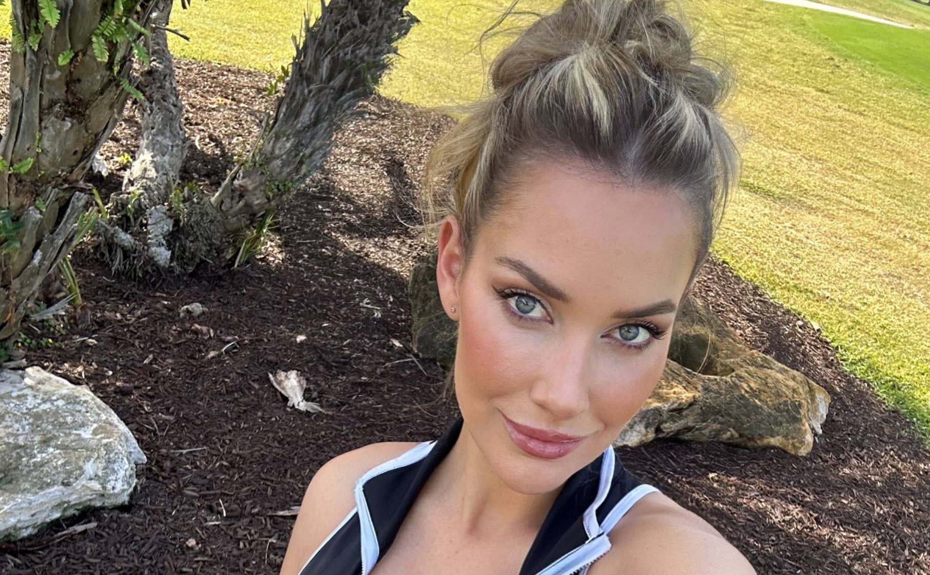 paige-spiranac-turns-heads-in-short-skirt-on-the-golf-course-the-spun