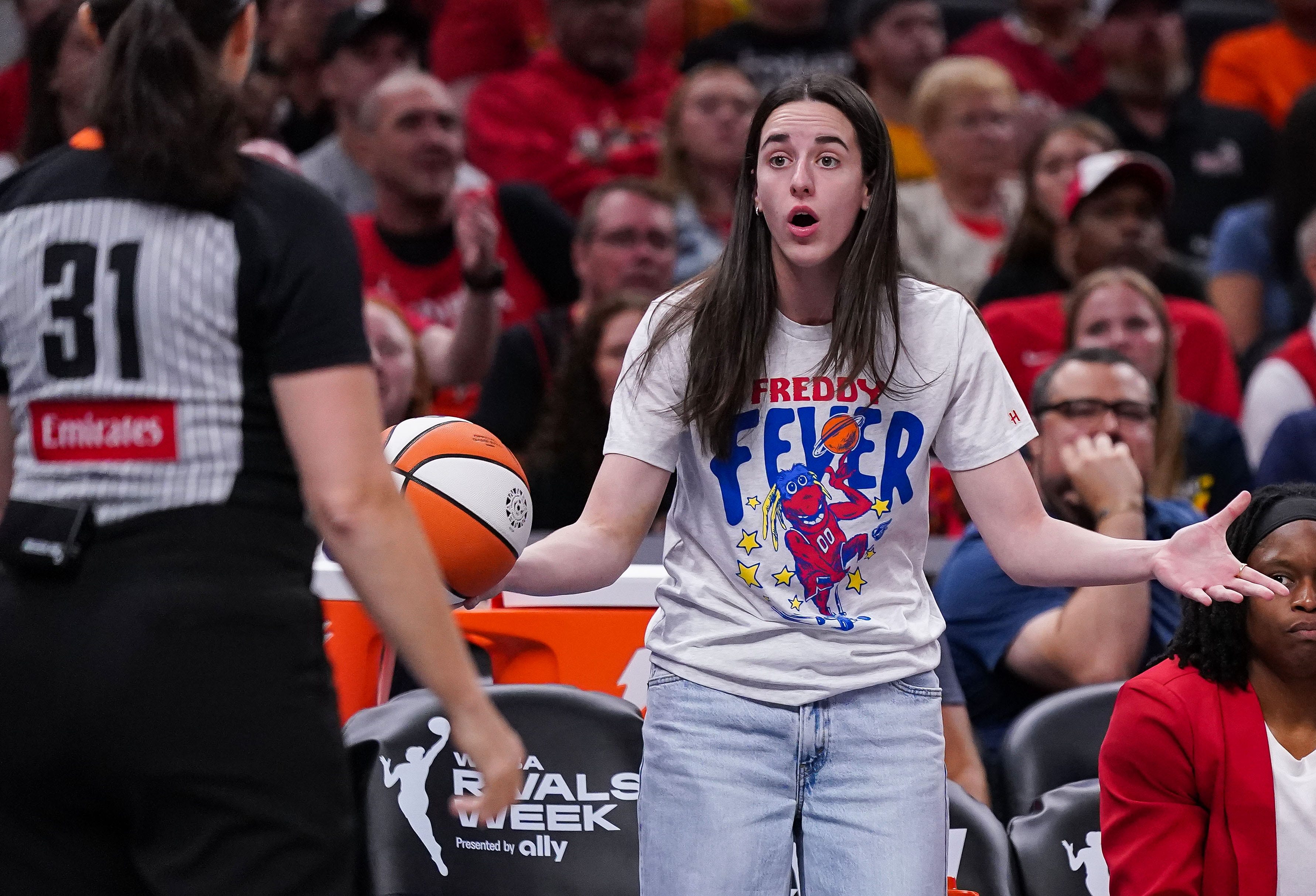 Caitlin Clark on the bench.