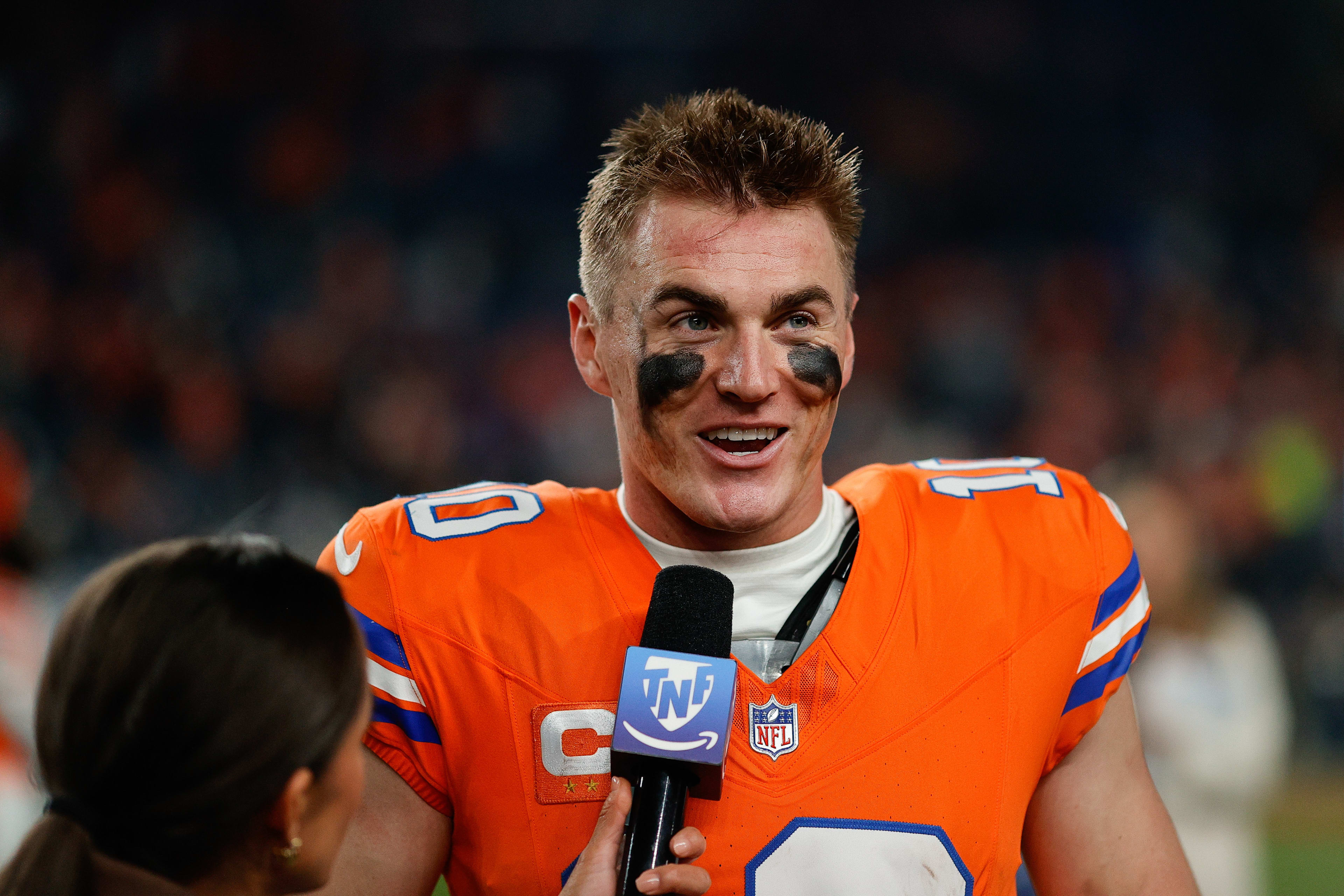 Broncos quarterback Bo Nix speaks to media.