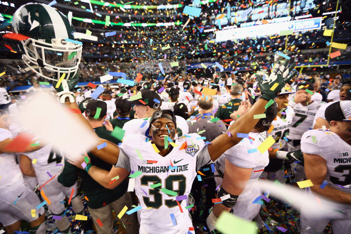 Jermaine Edmondson #39 of the Michigan State Spartans celebrates a 42-41 win against the Baylor Bears during the Goodyear Cotton Bowl Classic.