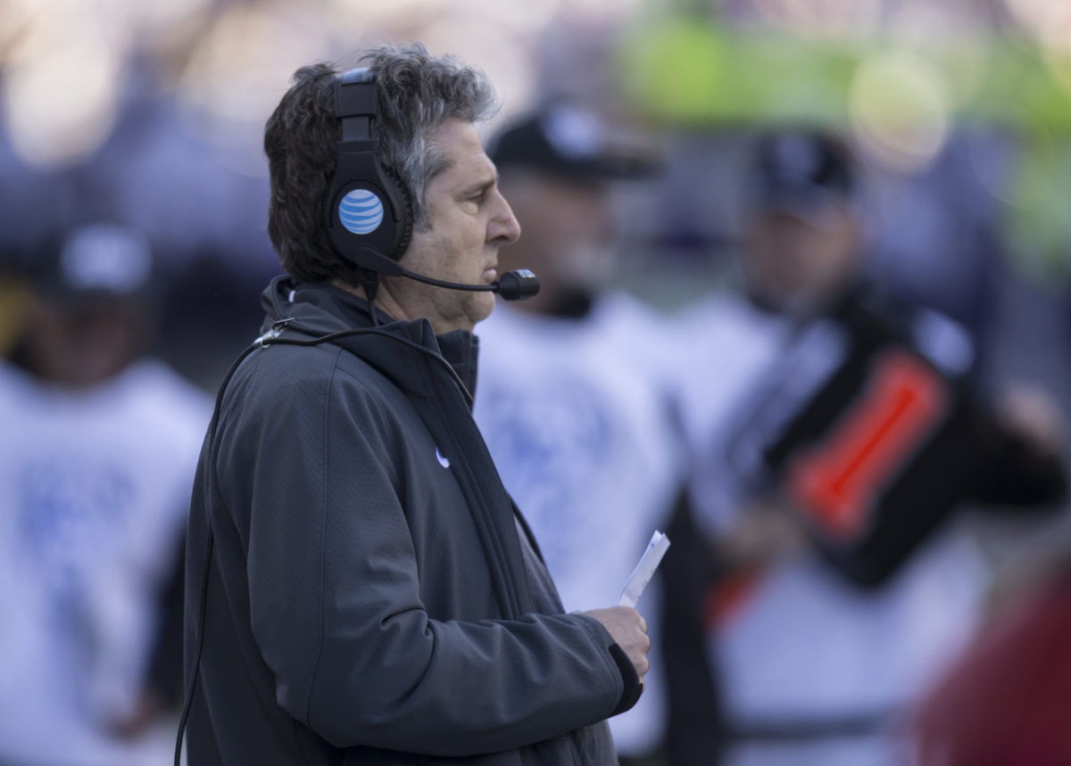 Mike Leach watches on during a game.