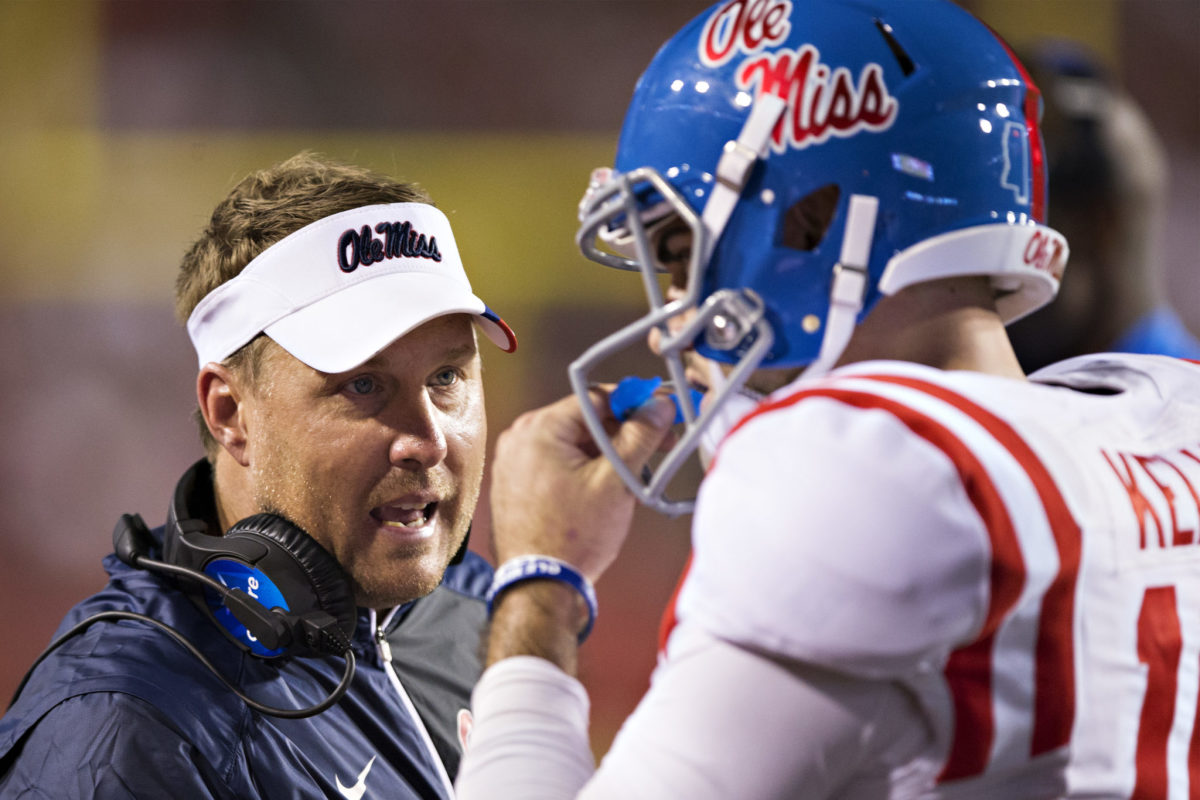 Hugh Freeze talking to Chad Kelly.