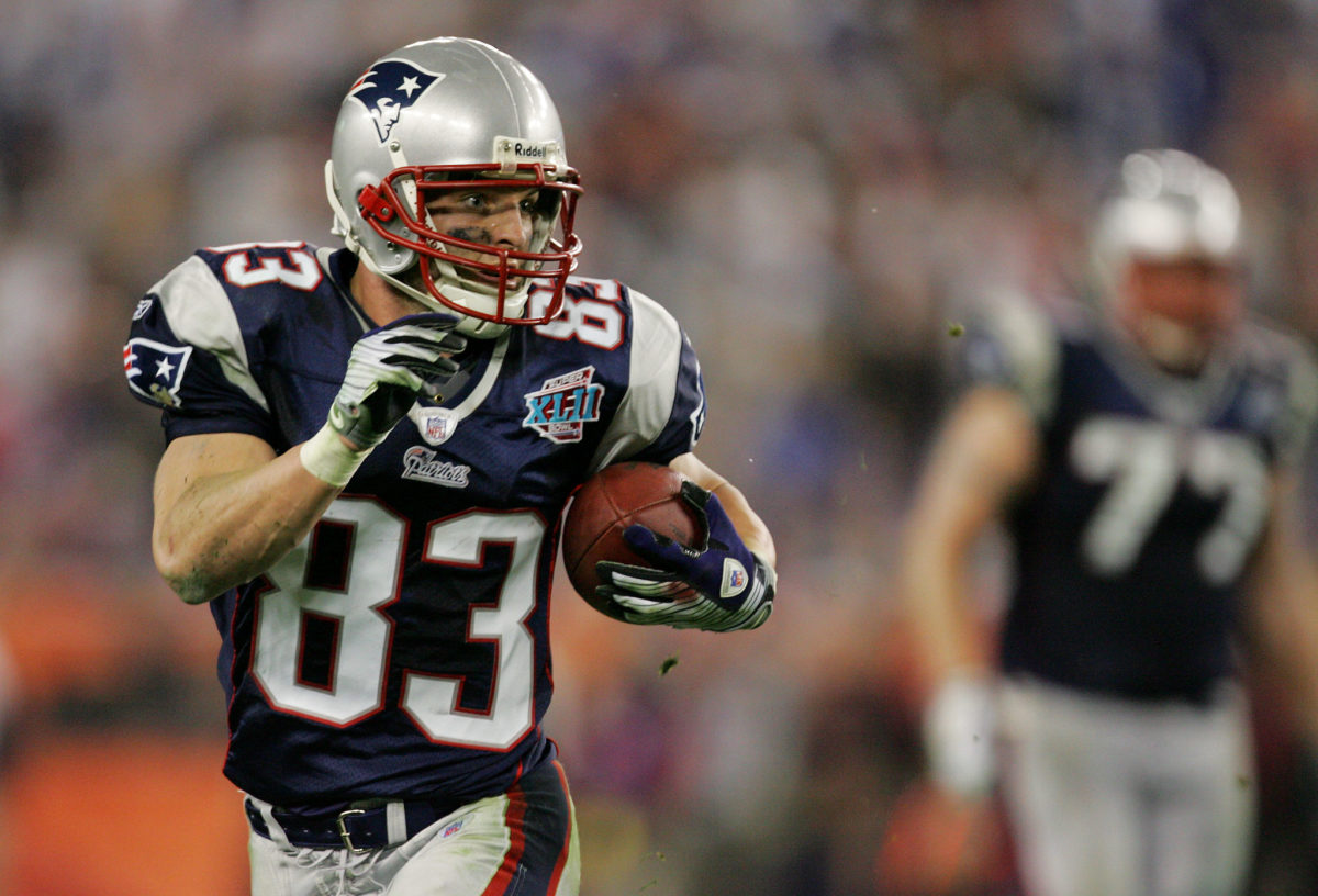 Wes Welker running with the football for the Patriots.