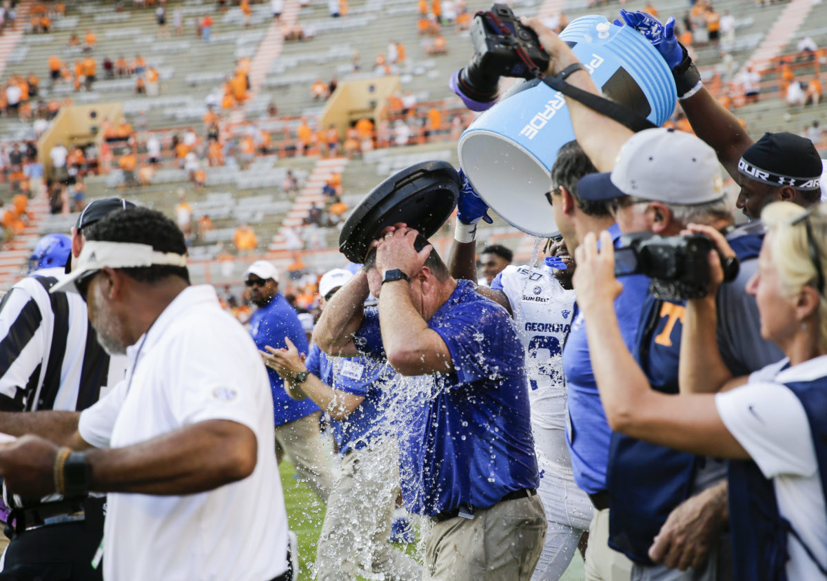 Georgia State football coach Shawn Elliott gets Gatorade bath after beating Tennessee.