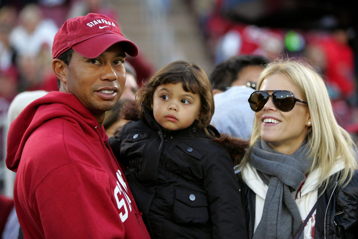 Tiger Woods y su ex mujer Elin Nordegren con uno de sus hijos.