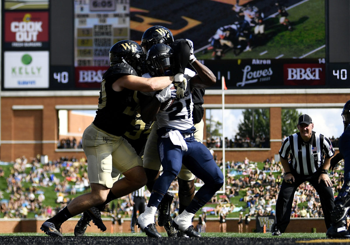 Wake Forest defensive end Carlos Basham in on a tackle against Utah State.